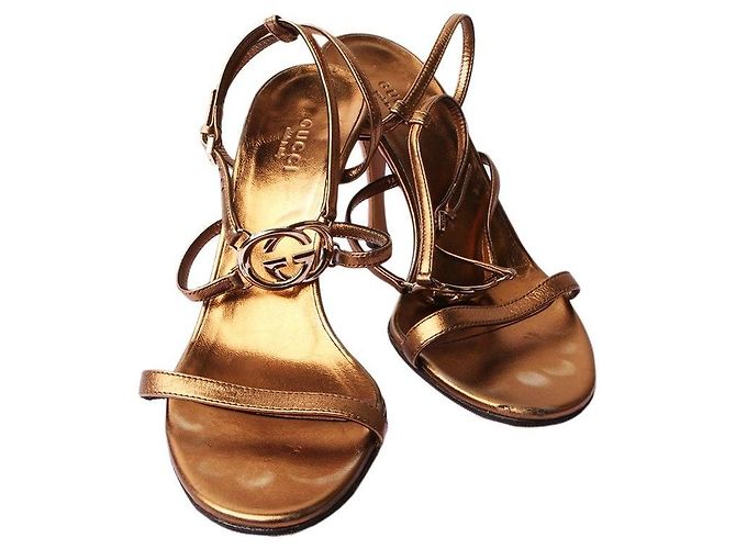 Gucci Décolleté e Sandali GG D'oro