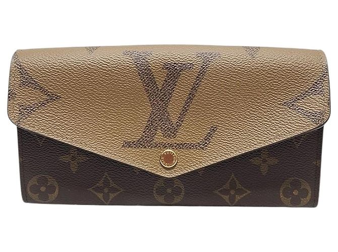 Louis Vuitton Cartera Long Sarah Monogram Reverse Giant Castaño