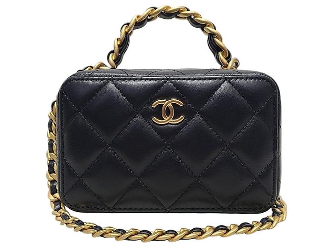 Vanity Chanel Mini bolsa de cosméticos de pele de cordeiro preta com alça de mão e corrente dourada com chip Preto