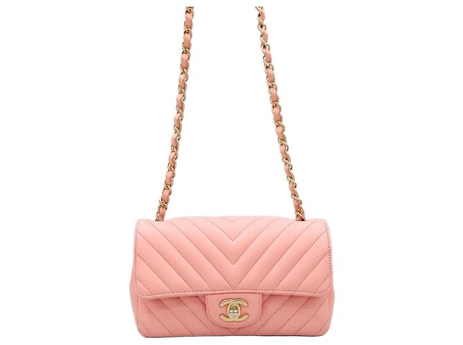 Chanel Mini bolsa de corrente Classic New Chevron Rosa