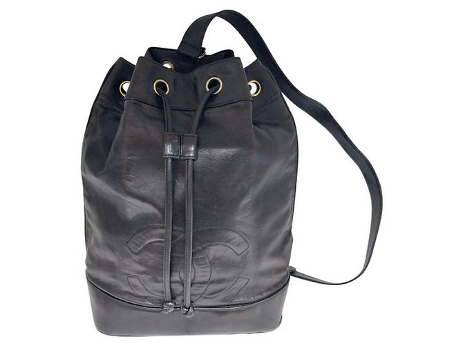 Chanel Black Lambskin CC Logo Drawstring Sling Bag Backpack