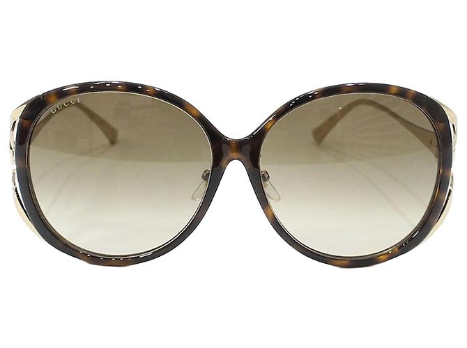 Gucci Gafas de sol oversize con estampado de leopardo Castaño