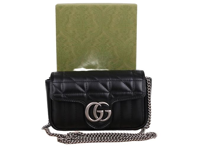 Gucci Mini bolsa de corrente acolchoada GG Marmont Preto