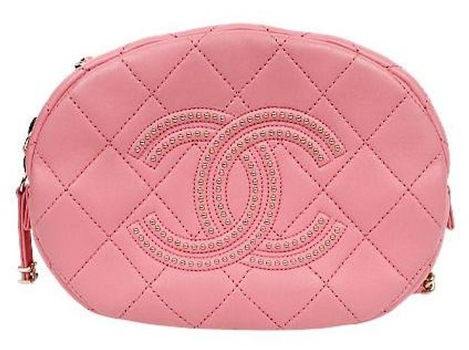 Chanel Bolsa Camera Big CC acolchoada rosa com tachas
