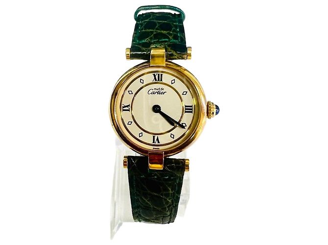 Cartier Round Must Watch