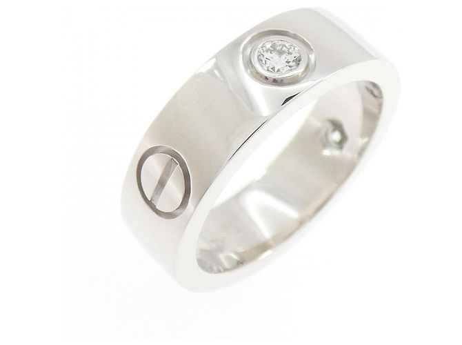 Cartier Love Ring mit halbem Diamanten