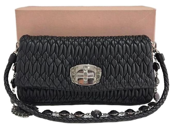 Miu Miu Bolsa de ombro matelassê Iconic Crystal Cloke Prata