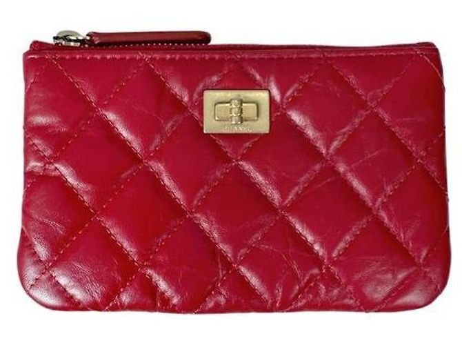 Chanel Mini Classic Pouch aus Kalbsleder Rot Gold