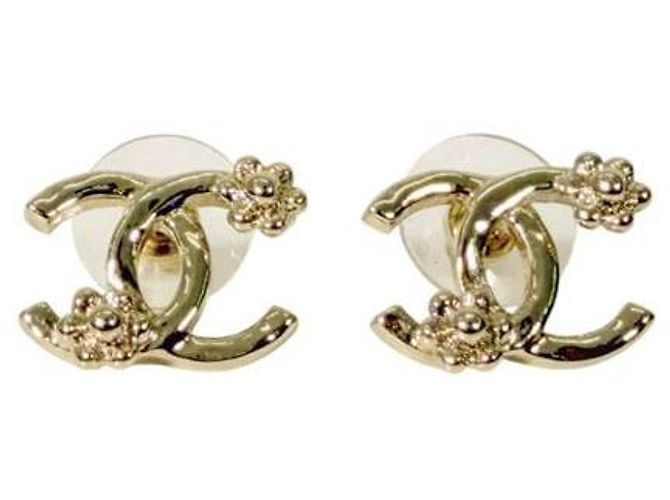 Chanel Boucles d'oreilles fleur de camélia en or Doré