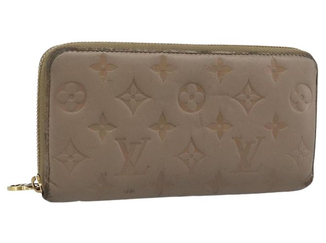 LOUIS VUITTON Cartera Zippy Monogram Emboss Long Wallet Beige M81511 Auth 192854