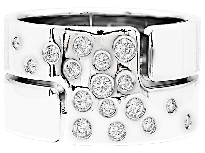 Anel Dinh Van "Seventies" em ouro branco e diamantes.