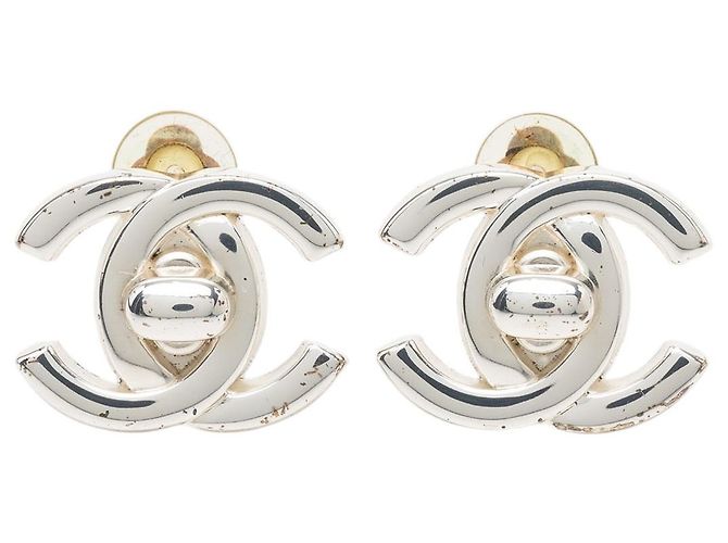 Chanel Clip-Ohrringe Silber CC Messing mit Turn Lock Verschluss