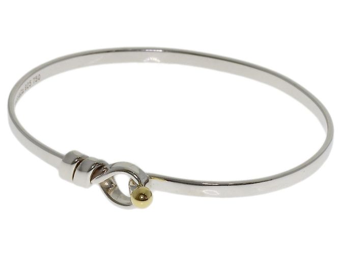 Pulseira de charms Tiffany & Co. em prata e ouro amarelo 18K