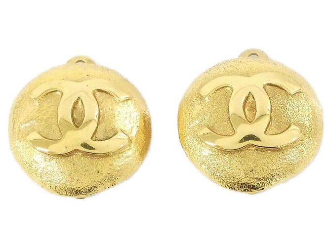 Boucles d'oreilles à clip dorées Chanel
