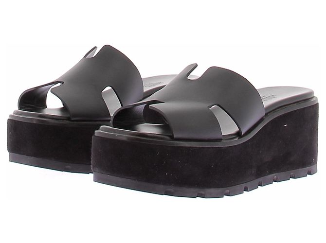 Hermès Mules Eze en cuir et daim noirs