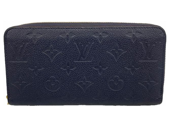 Cartera Zippy Monogram Empreinte Louis Vuitton Roja