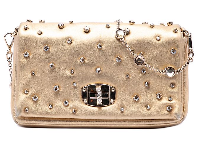 Miu Miu Bolsa transversal de aba em napa metálica dourada e strass Dourado