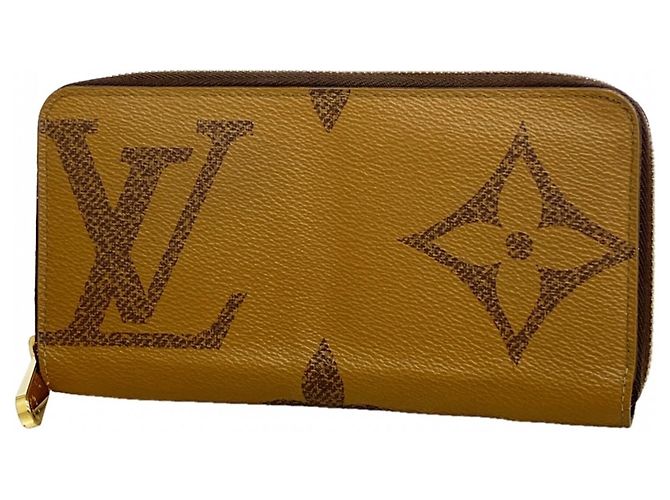 Cartera Zippy Monogram Giant Reverse Louis Vuitton Castaño