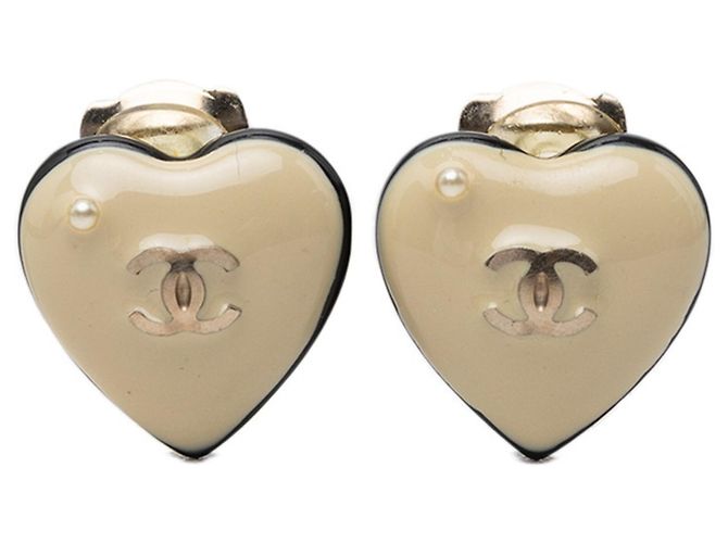 Orecchini a clip Chanel Coco Mark con motivo a cuore Nero Beige D'oro