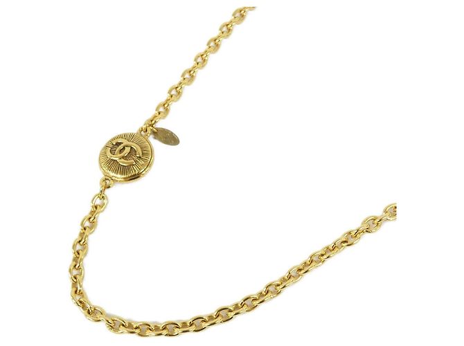 Colar Chanel dourado com pingente