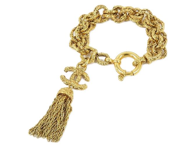 Pulseira de berloques Chanel em ouro Dourado