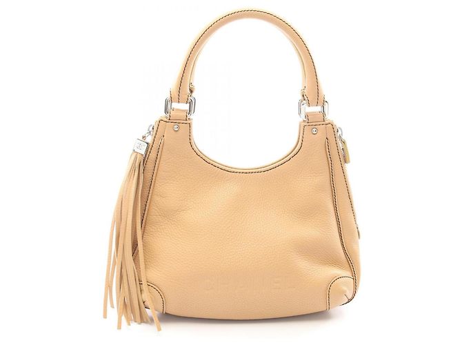 Bolso Chanel beige de piel caviar