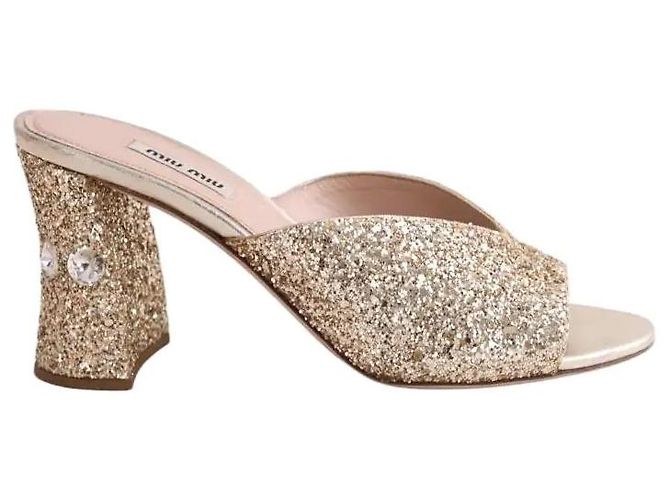 Mule Miu Miu dorate con paillettes D'oro
