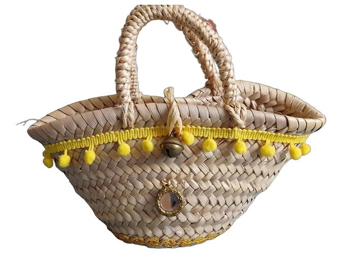 Autre Marque Cesto de palha trançada com pompons amarelos