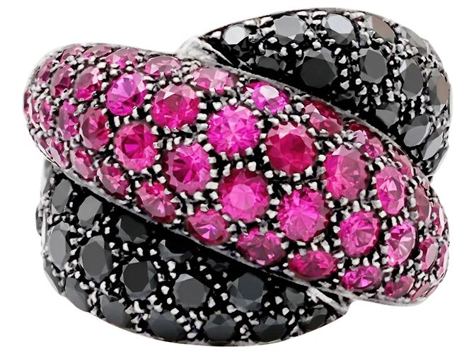 Anello Damiani "Gomitolo", diamanti neri e rubini.