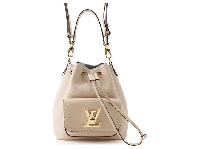 Bolsa de ombro em couro Louis Vuitton Lockme Bucket Bege