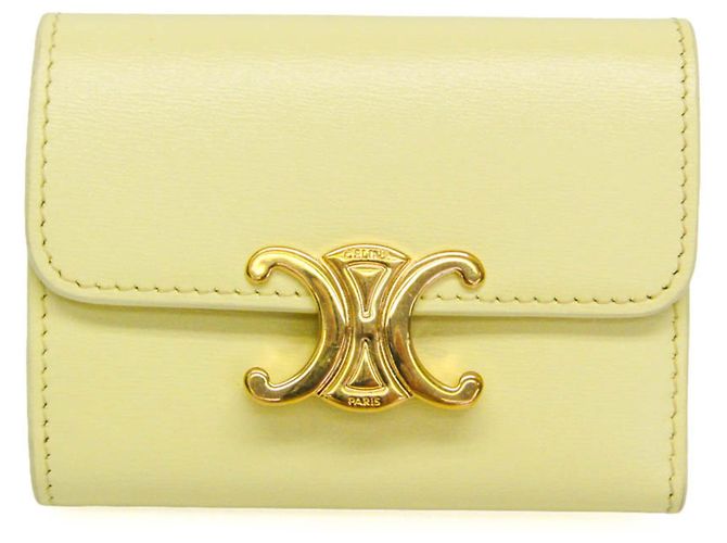 Céline Cartera compacta Triomphe Celine en amarillo