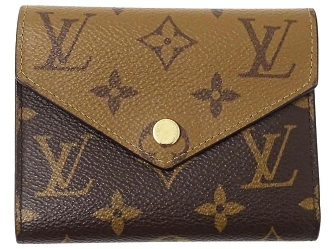 Louis Vuitton Monogram Reverse Tri-fold Wallet