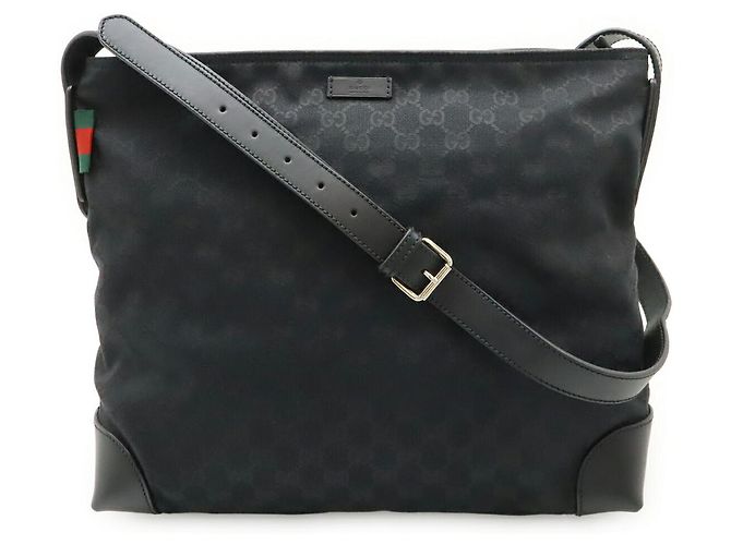 Sac à bandoulière Gucci GG Canvas et cuir Noir