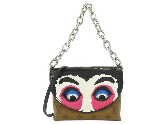 Pochette Louis Vuitton Monogram Kabuki Marron Fuschia