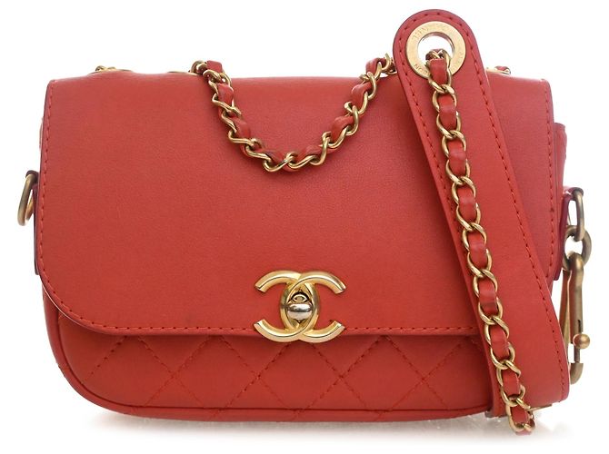Pochette de aba e porta-moedas em couro de vitelo matelassê vermelho Chanel