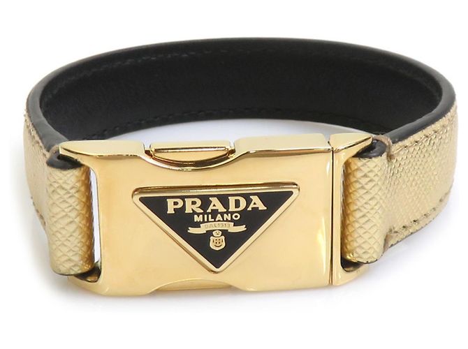 Bracciale Charm Prada in pelle e metallo dorato D'oro