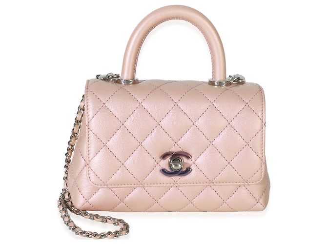 Bolso Chanel Mini Coco Top Handle Flap de Caviar Acolchado Iridiscente Rosa Claro Metálico