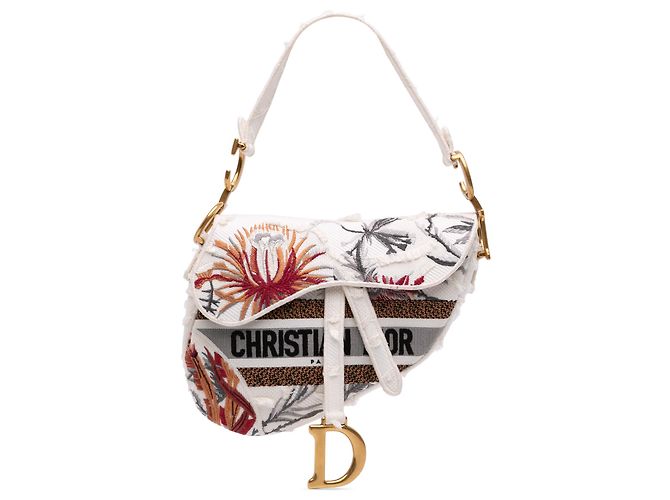 Sac Saddle Dior en toile blanche avec broderies de fleurs camouflage
