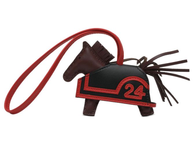 Charm per borsa Hermès Rodeo Robeo 24 in agnello Milo Rosso Bordò