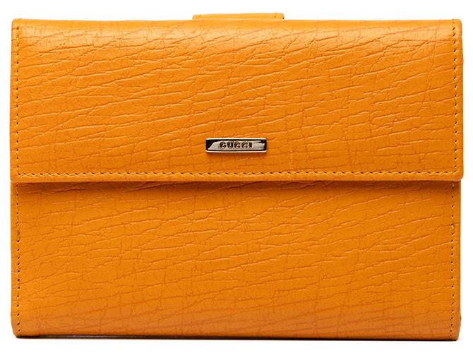Cartera bifold de piel de becerro texturizada naranja Gucci