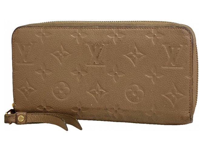 Cartera Zippy Monogram Empreinte Louis Vuitton Gris pardo