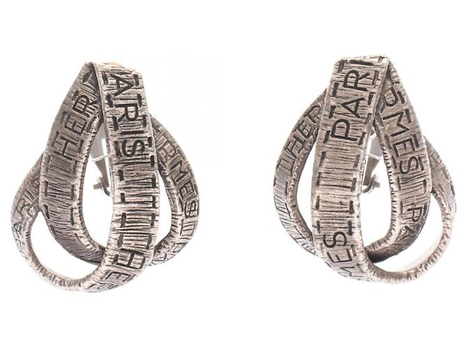 Hermès Boucles d'oreilles avec clip Ruban Hermes Argenté