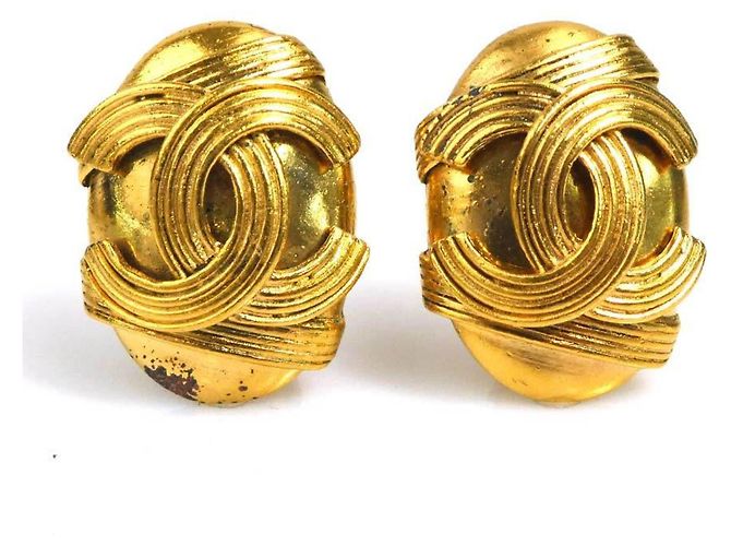Boucles d'oreilles à clip dorées Chanel