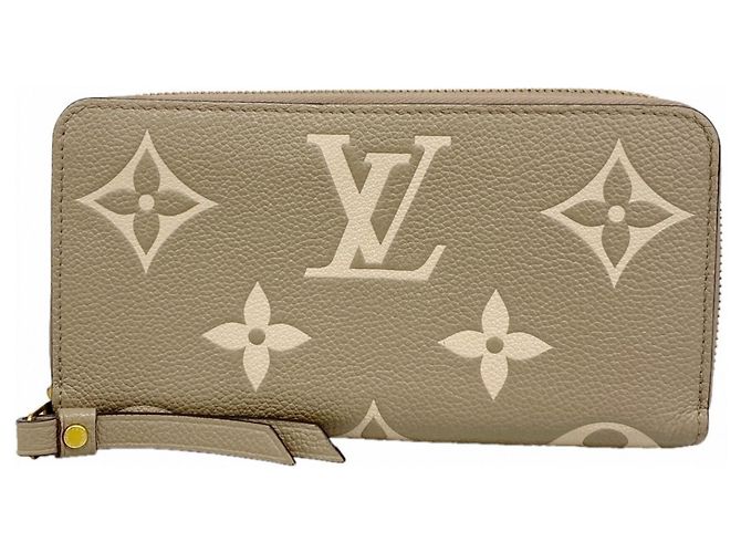 Cartera Zippy Monogram Empreinte Louis Vuitton Gris Crudo