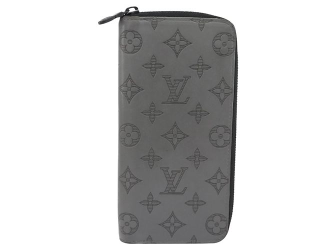 Louis Vuitton Cartera Zippy Vertical Monogram Shadow en piel Castaño