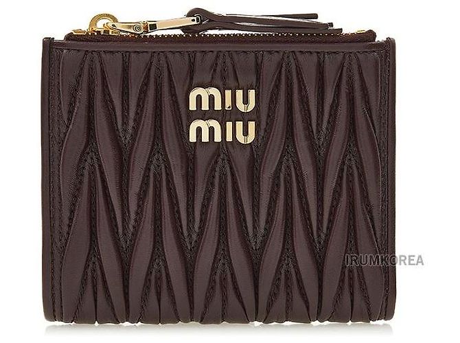 Miu Miu Carteira compacta matelassê Preto