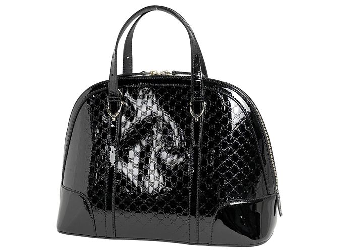 Bolsa Gucci Microguccissima em couro envernizado preto