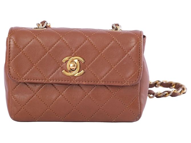 Timeless Bolsa transversal Chanel Extra Mini em couro matelassê Marrom