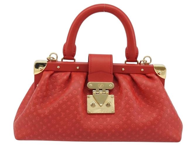 Clutch Louis Vuitton Monogram Top Handle in tela Monogram Rosso