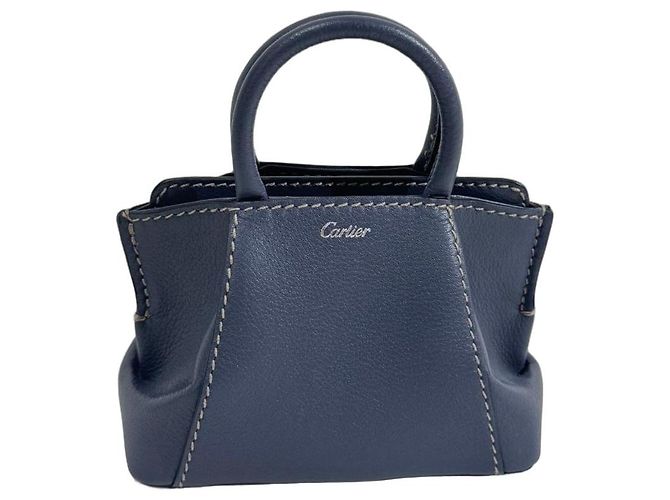 Cartier Micro bolsa de mão C em couro taurillon azul cinza